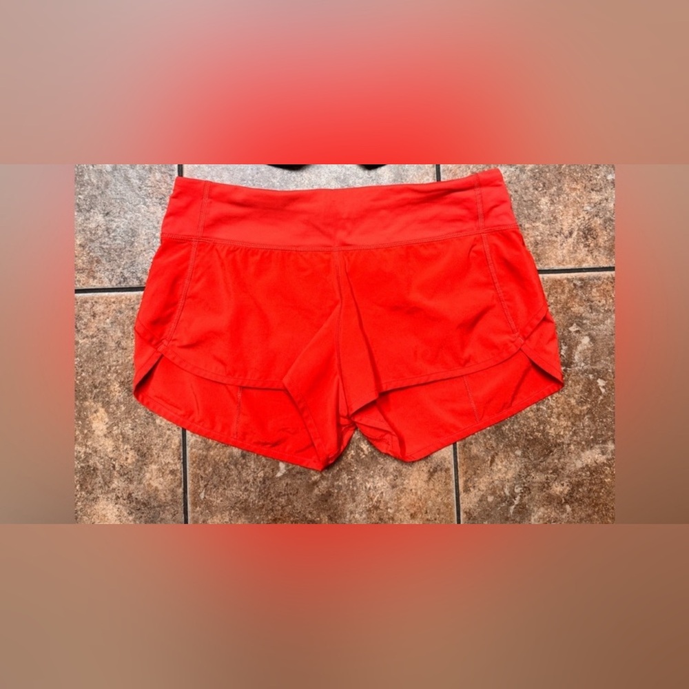 Lululemon Orange speed up shorts